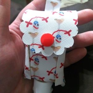 Sporke character hand sanitizer holder